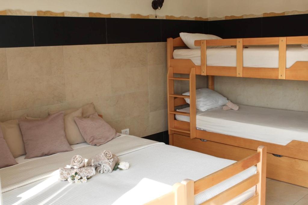 Postel nebo postele na pokoji v ubytování Mahakala Center