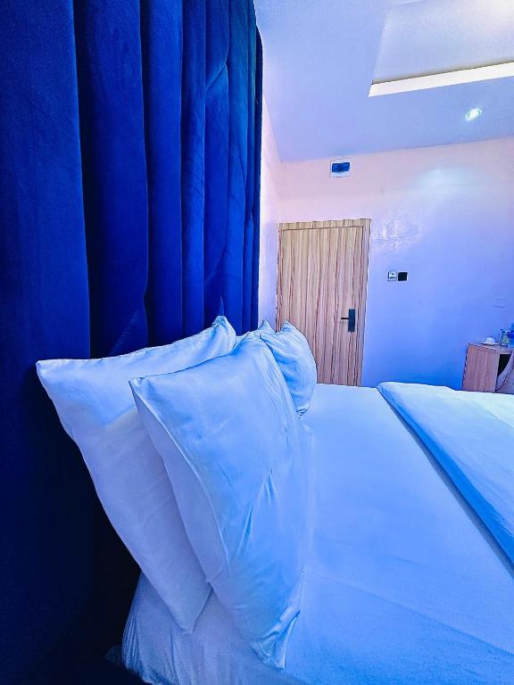 Postel nebo postele na pokoji v ubytování Hotel AREX