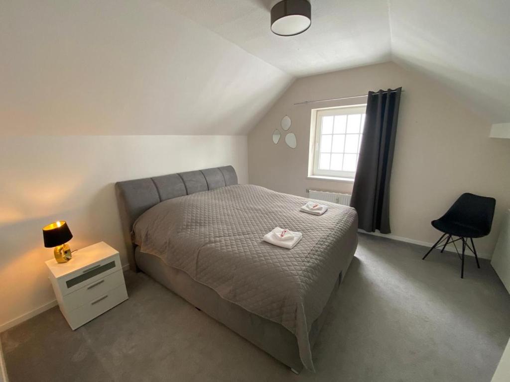 Postel nebo postele na pokoji v ubytování LivingSpace Messe Essen