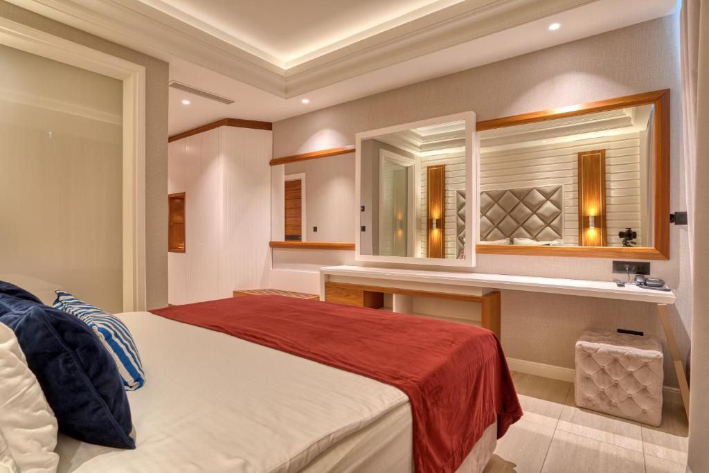 Postel nebo postele na pokoji v ubytování Boutique Hotel R Palazzo