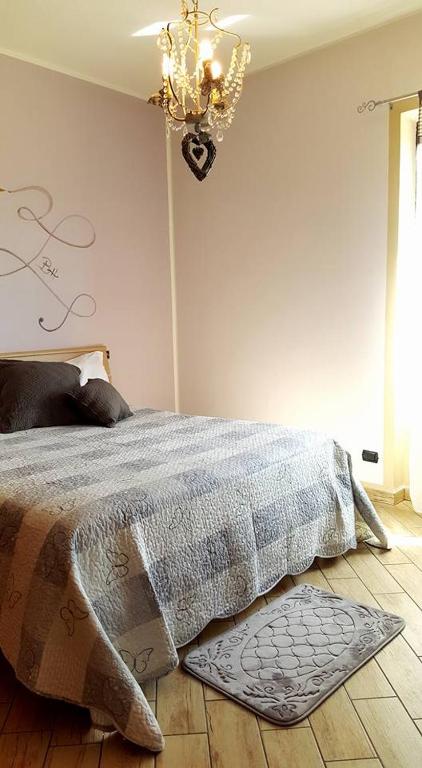 A bed or beds in a room at Relais Black Horse