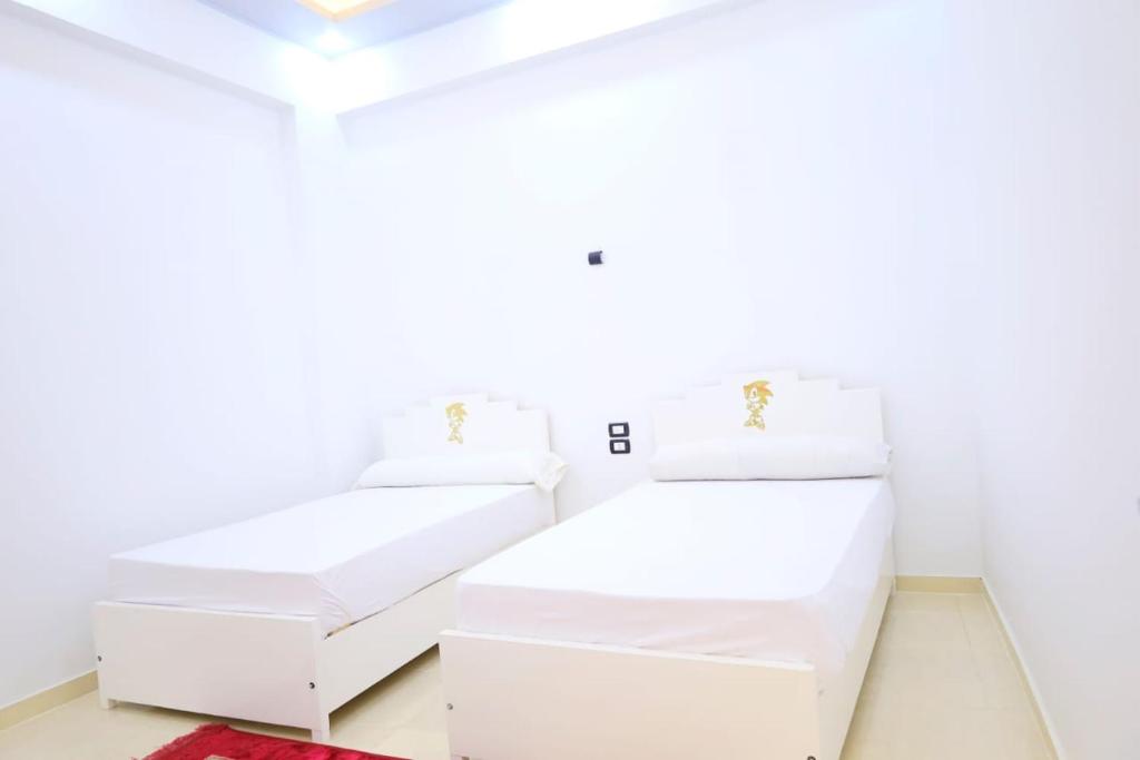 A bed or beds in a room at Tomorrow Land villa
