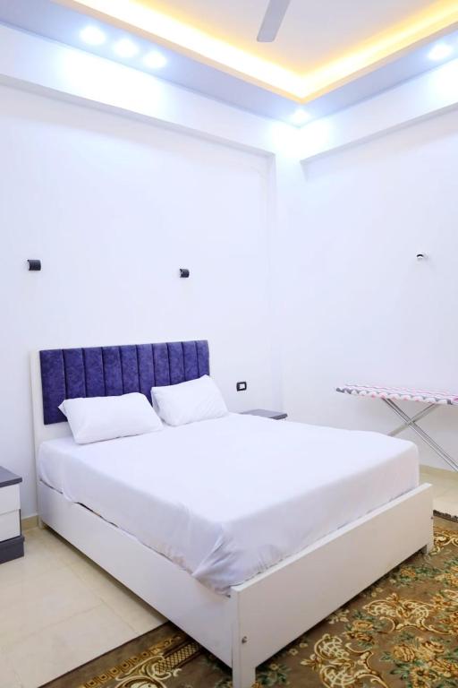 A bed or beds in a room at Tomorrow Land villa