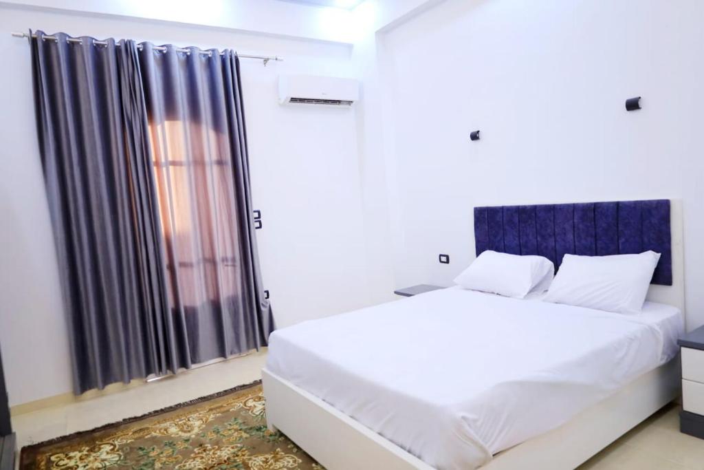 A bed or beds in a room at Tomorrow Land villa