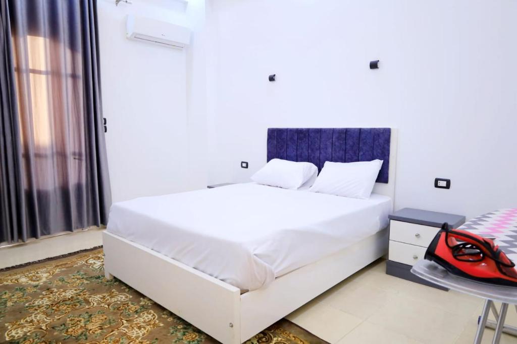 A bed or beds in a room at Tomorrow Land villa