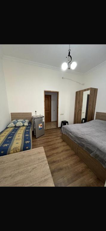 Postel nebo postele na pokoji v ubytování FIROSMANI house