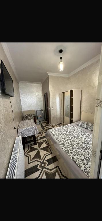 Postel nebo postele na pokoji v ubytování FIROSMANI house