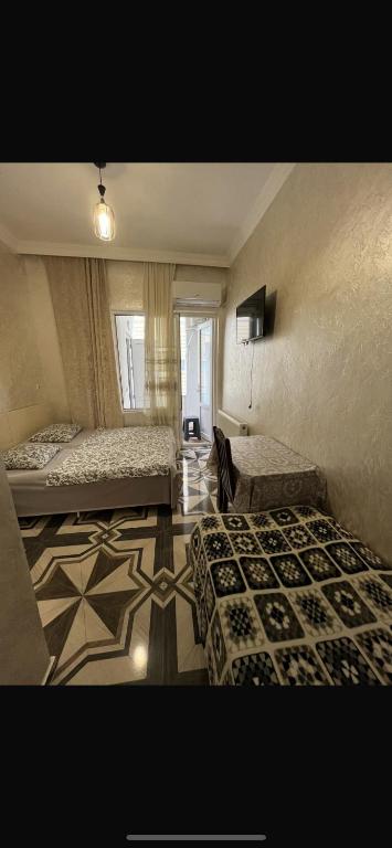 Postel nebo postele na pokoji v ubytování FIROSMANI house