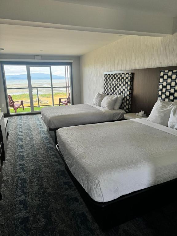 Postel nebo postele na pokoji v ubytování Sea Edge Motel