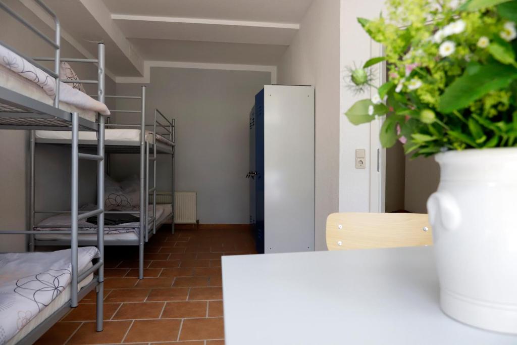 Postel nebo postele na pokoji v ubytování Pension Malchin