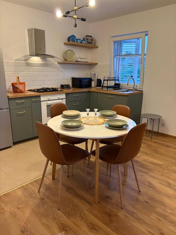 Kuchyň nebo kuchyňský kout v ubytování Apartment KIM