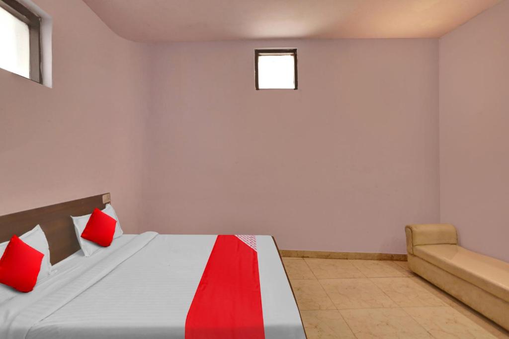 Postel nebo postele na pokoji v ubytování Hotel O Doraemon Residency