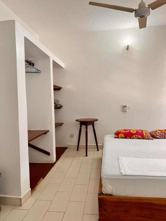 Postel nebo postele na pokoji v ubytování Honeydream Villa