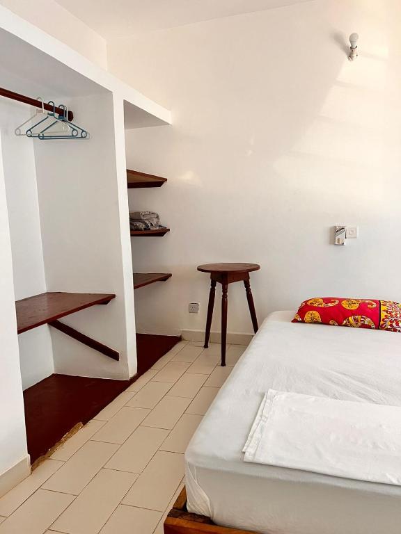 Postel nebo postele na pokoji v ubytování Honeydream Villa
