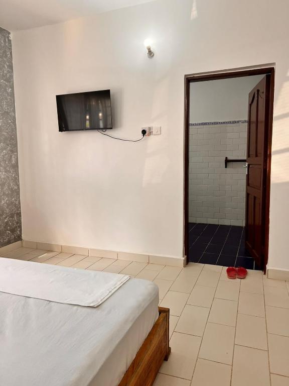 Postel nebo postele na pokoji v ubytování Honeydream Villa