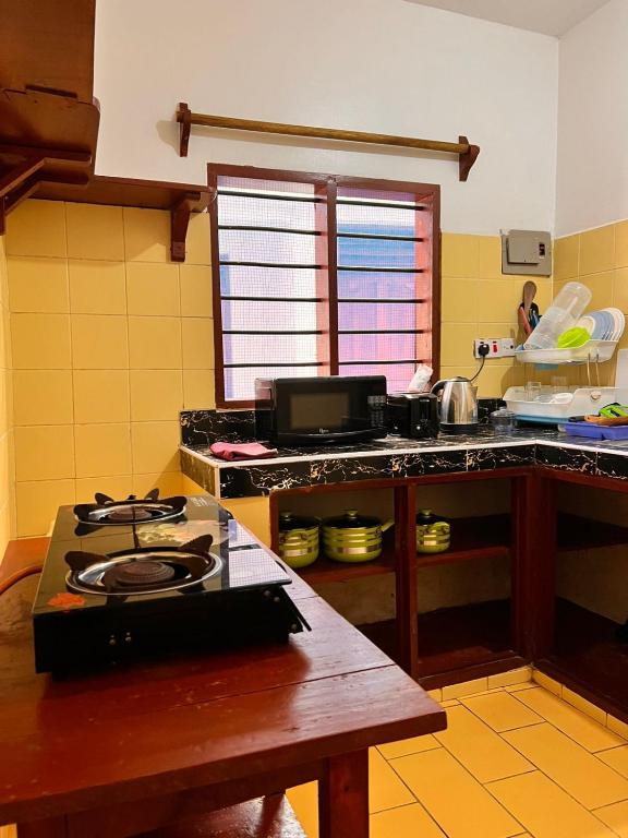 Kuchyň nebo kuchyňský kout v ubytování Honeydream Villa