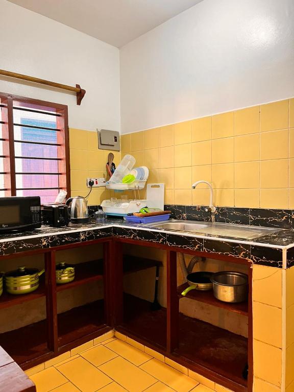 Kuchyň nebo kuchyňský kout v ubytování Honeydream Villa