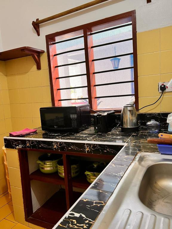 Kuchyň nebo kuchyňský kout v ubytování Honeydream Villa