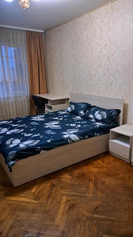 Llit o llits en una habitació de Traian