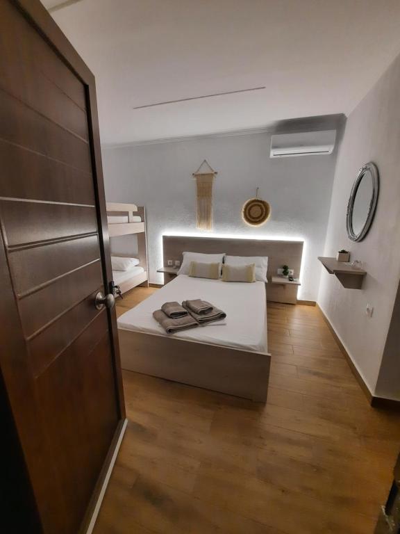 Postel nebo postele na pokoji v ubytování Bungalows anestis