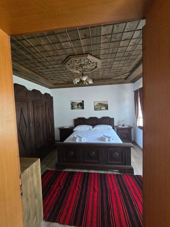 Postel nebo postele na pokoji v ubytování Guest House J.Prifti