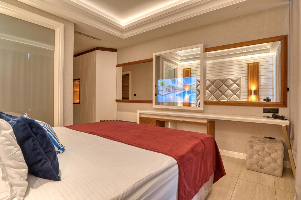 Postel nebo postele na pokoji v ubytování Boutique Hotel R Palazzo