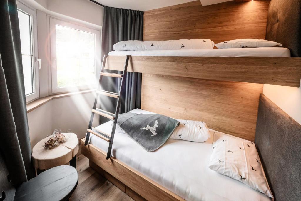 Postel nebo postele na pokoji v ubytování Appartement- und Wellnesshotel Winkler