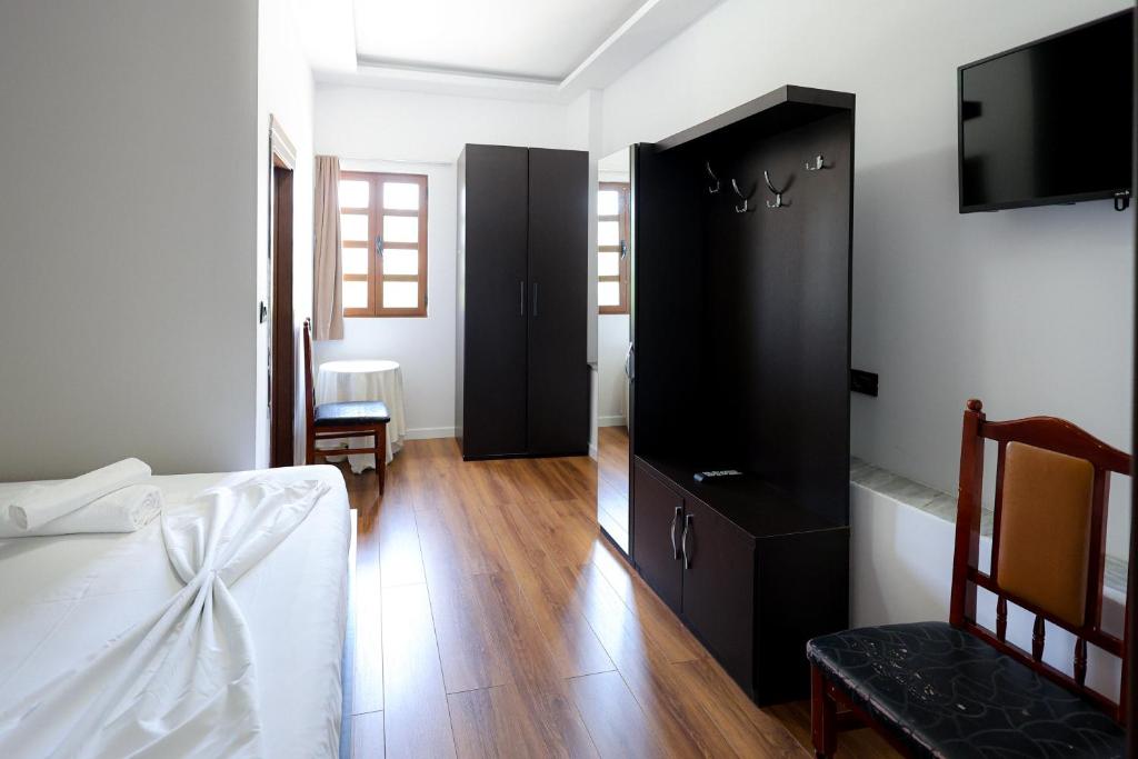 Postel nebo postele na pokoji v ubytování Hotel Ajka