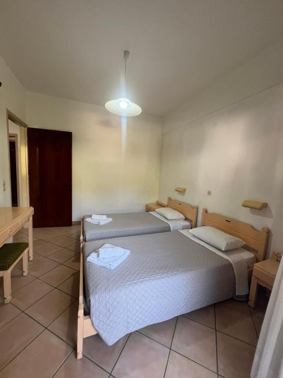 Postel nebo postele na pokoji v ubytování Villa Rebecca