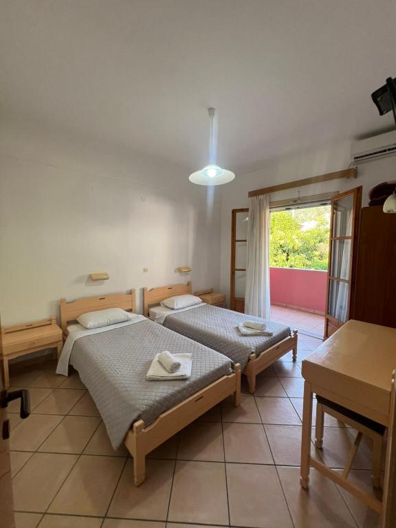 Postel nebo postele na pokoji v ubytování Villa Rebecca