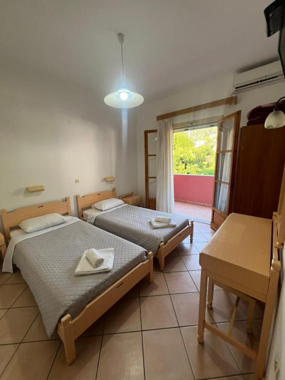 Postel nebo postele na pokoji v ubytování Villa Rebecca