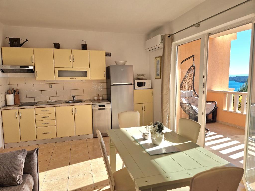 Kuchyňa alebo kuchynka v ubytovaní Apartment Elza