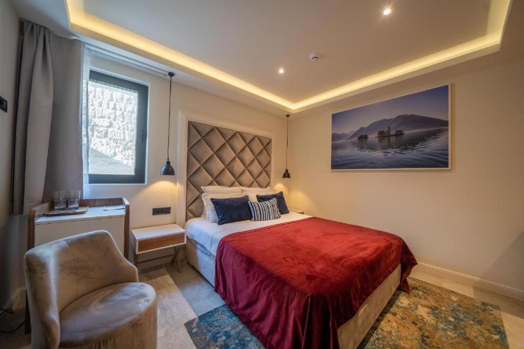 Postel nebo postele na pokoji v ubytování Boutique Hotel R Palazzo