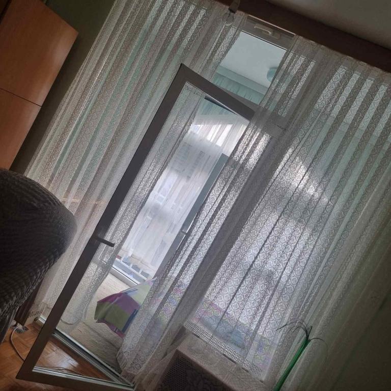 TV a/nebo společenská místnost v ubytování Apartman Mina