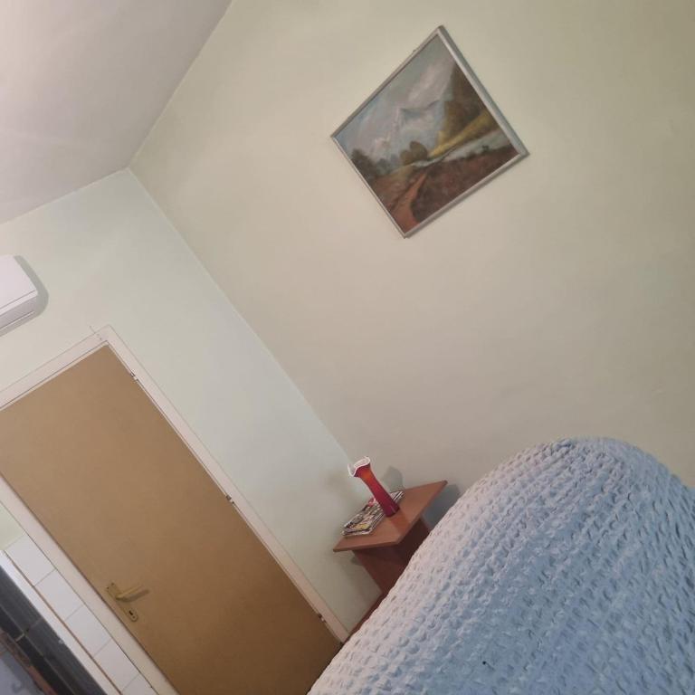 Postel nebo postele na pokoji v ubytování Apartman Mina
