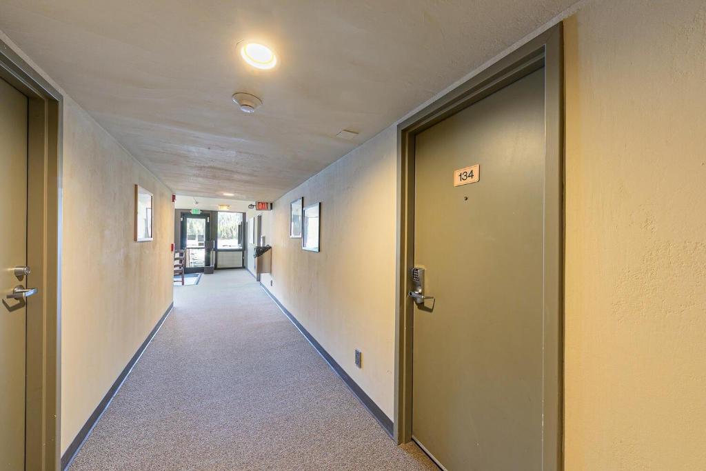 an empty hallway with doors in an office building at 134 Bldg C studio in Truckee