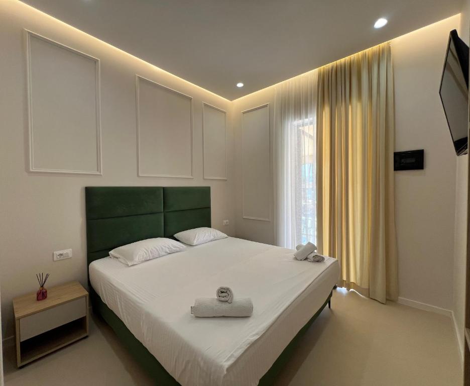 Postel nebo postele na pokoji v ubytování Mare Rooms Vlore