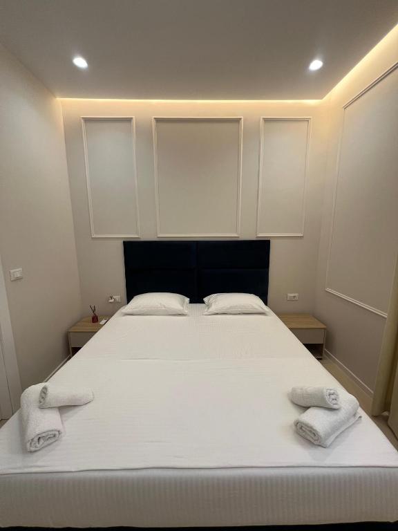 Postel nebo postele na pokoji v ubytování Mare Rooms Vlore