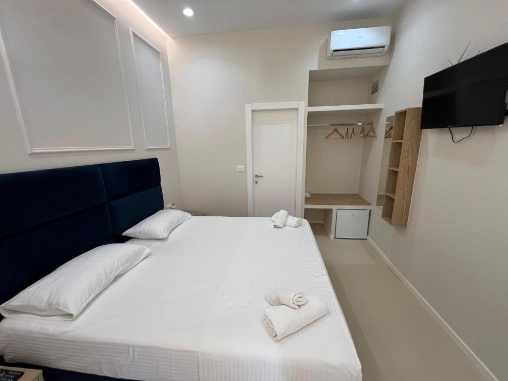 Postel nebo postele na pokoji v ubytování Mare Rooms Vlore