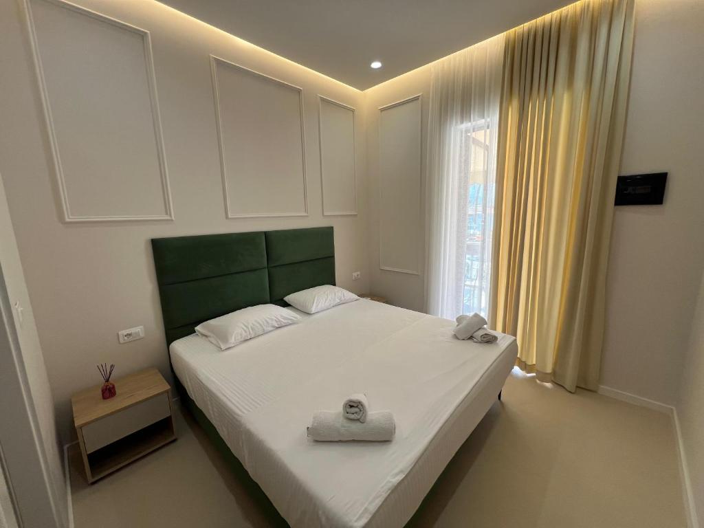 Postel nebo postele na pokoji v ubytování Mare Rooms Vlore