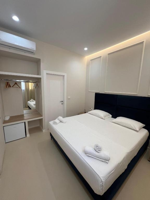 Postel nebo postele na pokoji v ubytování Mare Rooms Vlore