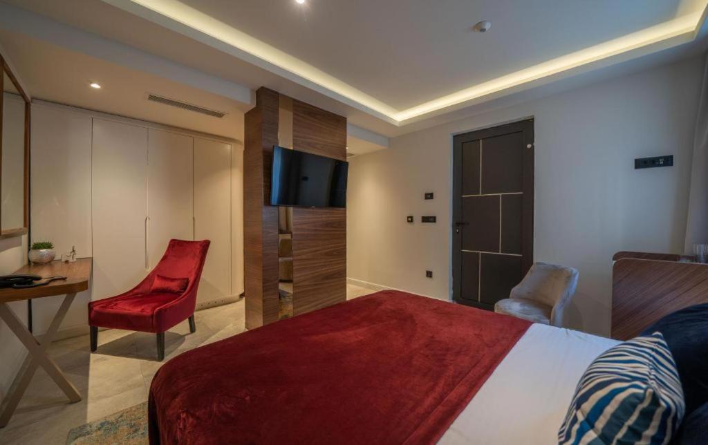 Postel nebo postele na pokoji v ubytování Boutique Hotel R Palazzo