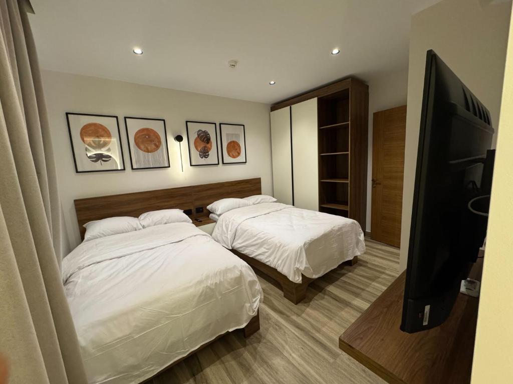 Postel nebo postele na pokoji v ubytování House 98 - Modern Boutique Stay in Zayed