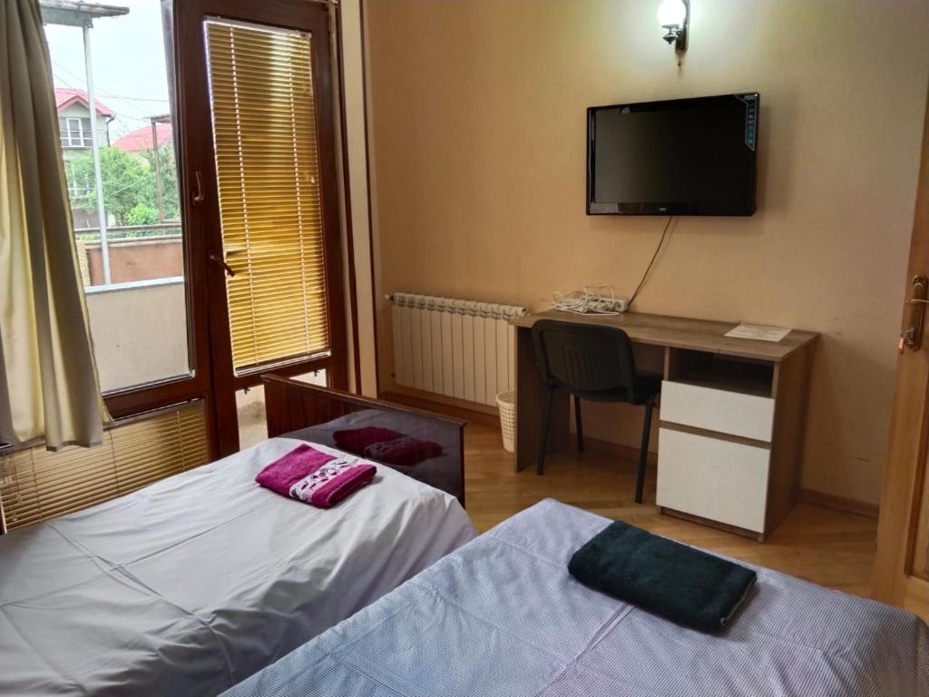 Postel nebo postele na pokoji v ubytování Villa Vanila