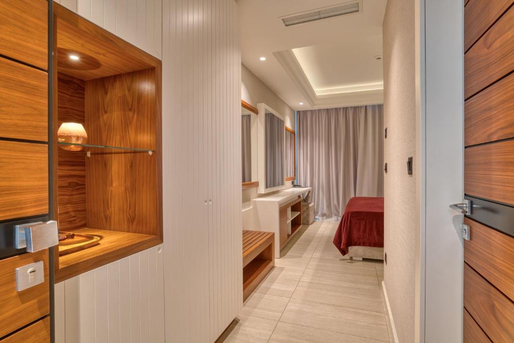 Postel nebo postele na pokoji v ubytování Boutique Hotel R Palazzo