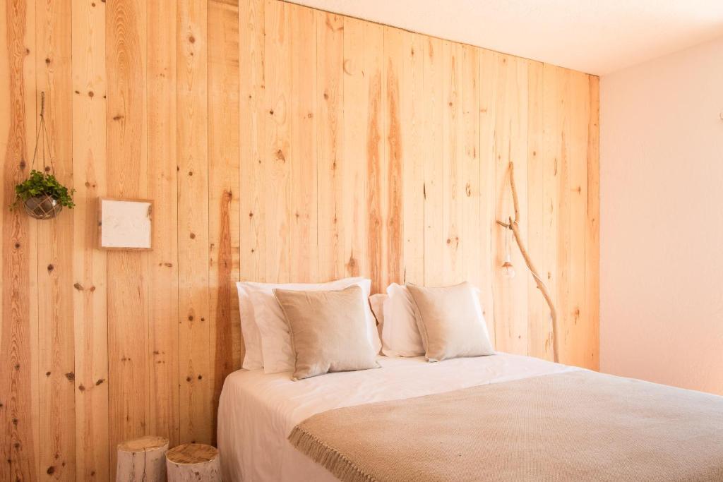 Postel nebo postele na pokoji v ubytování Utopia