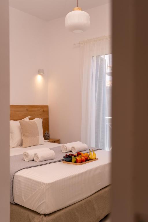 Postel nebo postele na pokoji v ubytování Noemia Skiathos