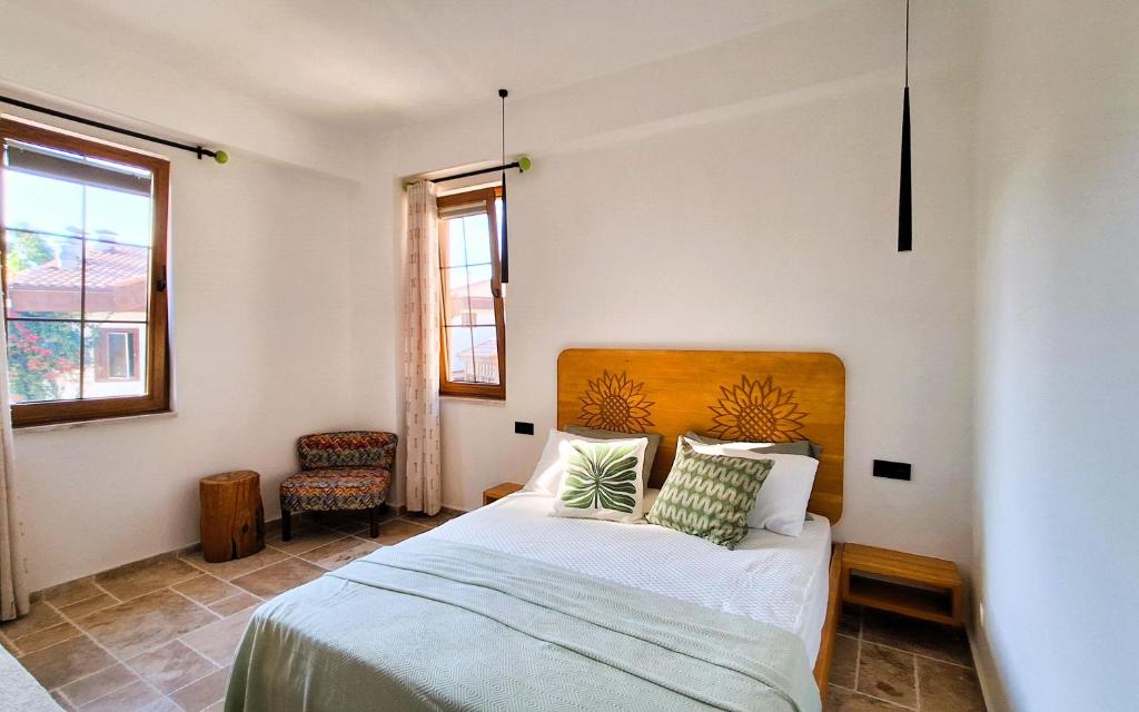 Postel nebo postele na pokoji v ubytování Alchemy Rooms Side