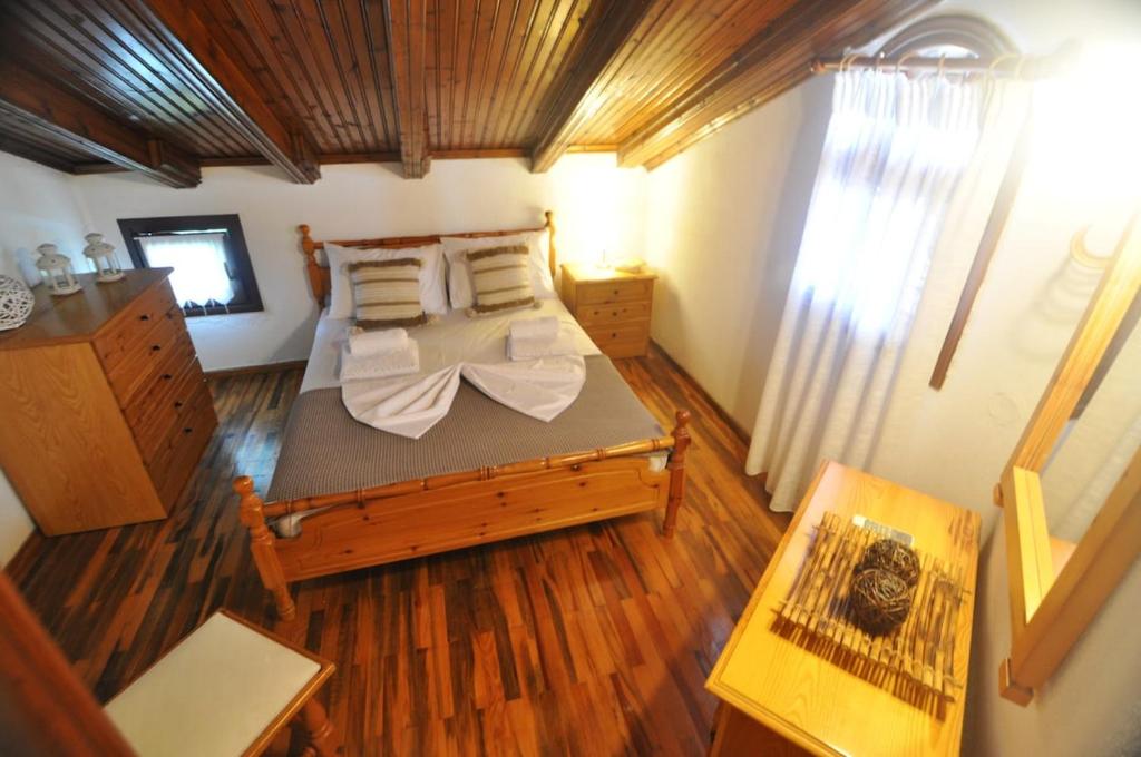 Postel nebo postele na pokoji v ubytování Palm Nest Villa with private pool in Chalkidiki