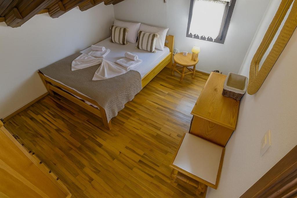 Postel nebo postele na pokoji v ubytování Palm Nest Villa with private pool in Chalkidiki
